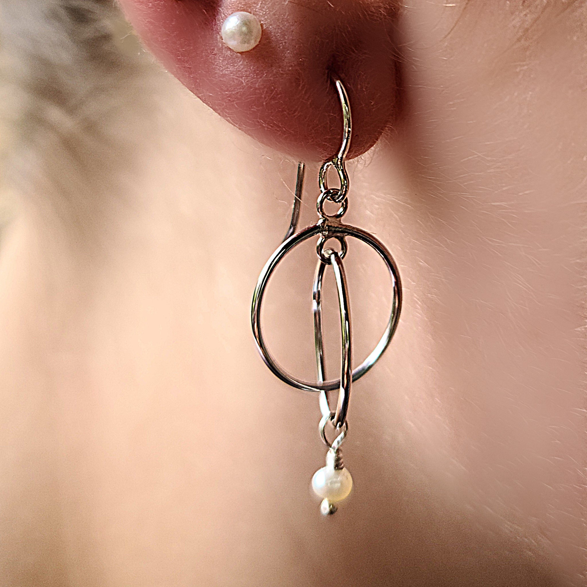 Model wearing Sterling Silver with Freshwater Pearl earrings