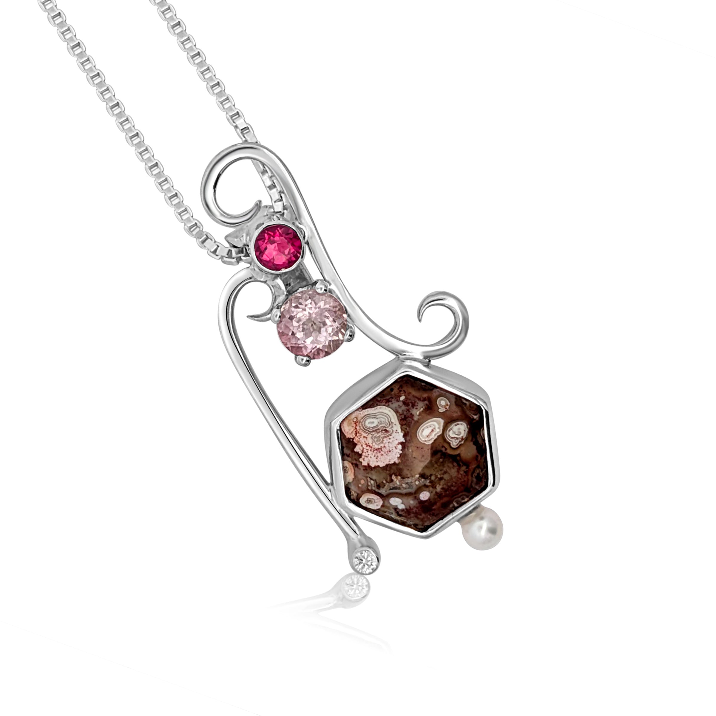 Sterling Silver pendant with Thompsonite, Pink Tourmaline, Pink Topaz, Cubic Zirconia and Freshwater Pearl, includes an 18 inch Sterling Silver box chain.