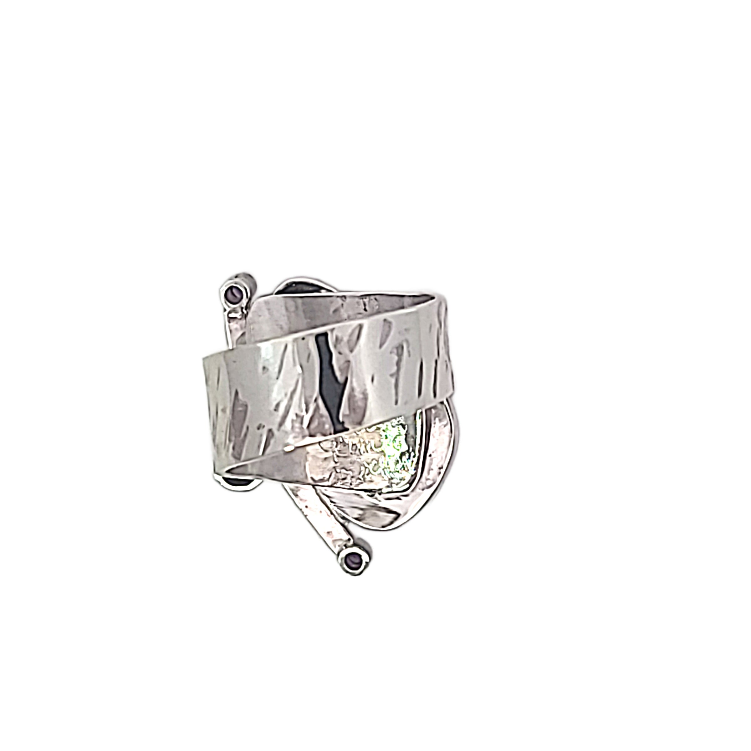 Back of adjustable Sterling ring with purple Mohave Turquoise, Iolite and Amethyst.