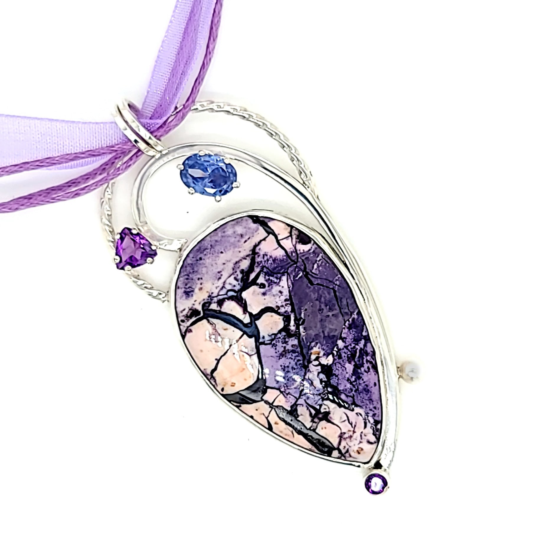 Tiffany Stone, Amethyst, Lab Tanzanite and Freshwater Pearl Pendant set in Sterling Silver.