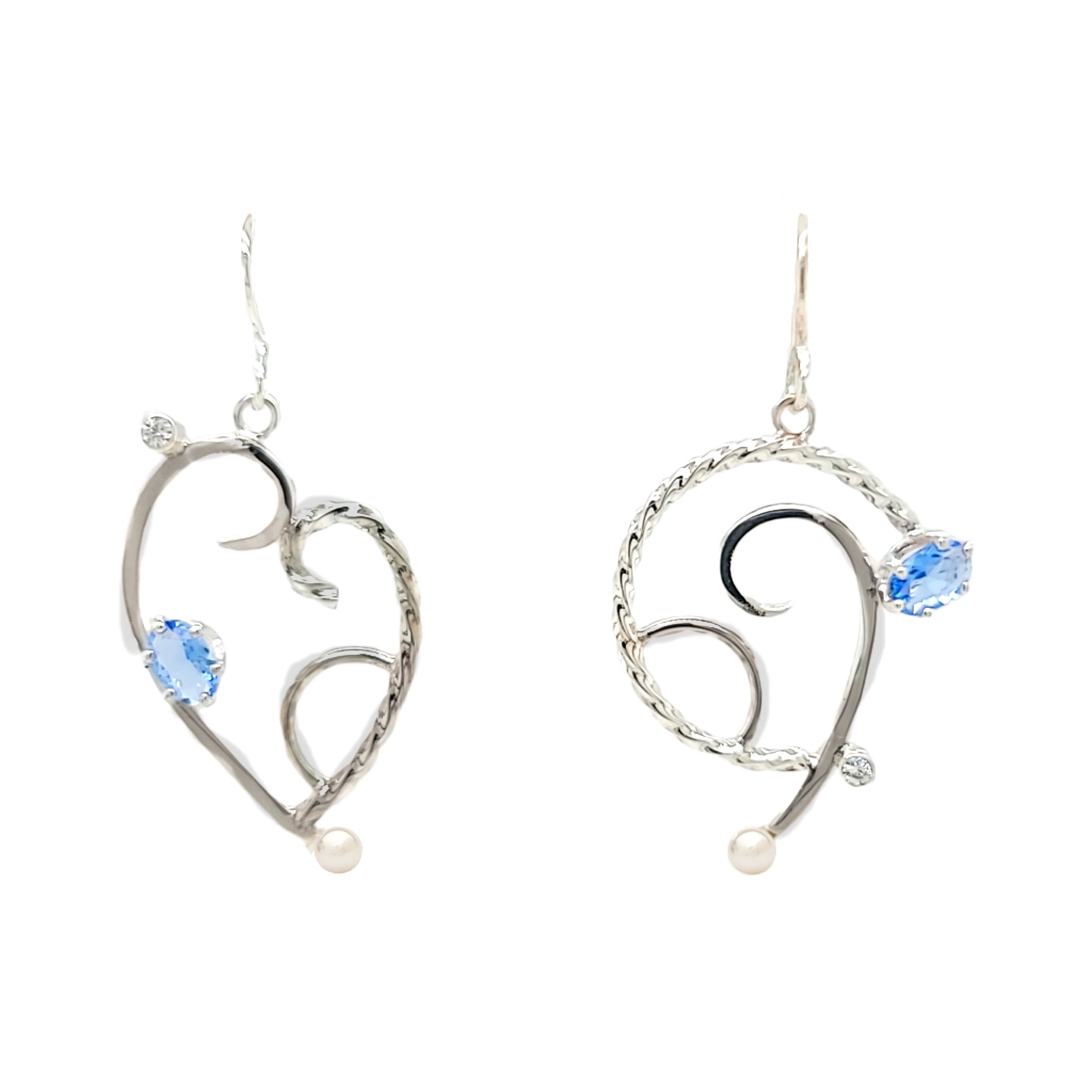 Asymmetric Sterling Silver earrings with Tanzanite Cubic Zirconia, Cubic Zirconia and Freshwater Pearls.
